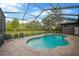 Enjoy this screened in pool with paved deck and lush yard, creating a private and refreshing outdoor retreat at 5825 Terncrest Dr, Lithia, FL 33547