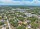 Aerial view of neighborhood, showcasing the home's location near local amenities and lush landscapes at 612 Sw Beverly Ave, Largo, FL 33770