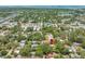 Scenic aerial view showing tree coverage surrounding the property location in neighborhood at 612 Sw Beverly Ave, Largo, FL 33770