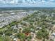 Aerial view showing the neighborhood and tree coverage surrounding the property location at 612 Sw Beverly Ave, Largo, FL 33770
