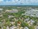 Aerial view of the neighborhood, trees and surrounding community at 612 Sw Beverly Ave, Largo, FL 33770