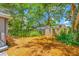 Private backyard with wood fencing and ample space for landscaping and outdoor activities at 612 Sw Beverly Ave, Largo, FL 33770