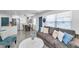 Open-concept living space with a view of the kitchen and dining area at 6507 La Mesa Cir, Tampa, FL 33634