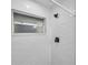Bright tiled shower with window and matte black hardware at 6507 La Mesa Cir, Tampa, FL 33634