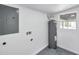 Utility room features a water heater at 6507 La Mesa Cir, Tampa, FL 33634