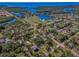 Breathtaking aerial view of a coastal community with waterways and lush greenery at 6521 Oelsner St, New Port Richey, FL 34652