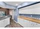 Well-equipped kitchen with stainless steel appliances and wood countertops at 6521 Oelsner St, New Port Richey, FL 34652