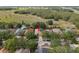 Aerial view of this home in a neighborhood with green space and mature trees at 6914 Monarch Park Dr, Apollo Beach, FL 33572