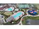 Aerial view of the community pool and recreation area, offering a variety of amenities for residents at 6914 Monarch Park Dr, Apollo Beach, FL 33572