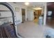Bedroom with a view to the kitchen, featuring a bunk bed and light flooring at 804 67Th W St, Bradenton, FL 34209