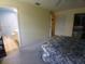 A view into the spacious bedroom with an en-suite bathroom at 804 67Th W St, Bradenton, FL 34209
