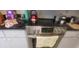Kitchen features a stainless steel electric range and oven at 804 67Th W St, Bradenton, FL 34209