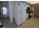 Bright kitchen with modern appliances and adjacent laundry access at 804 67Th W St, Bradenton, FL 34209