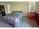 The spacious main bedroom provides ample natural light through two large windows at 804 67Th W St, Bradenton, FL 34209