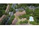 Aerial shot showing a community with a pool, parking, and well-maintained landscaping at 8545 Hunters Key Cir, Tampa, FL 33647