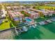 Gorgeous waterfront condo complex featuring a community pool and convenient boat docks at 8921 Blind Pass Rd # 142, St Pete Beach, FL 33706