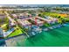 Waterfront condo complex with a community pool and boat docks along the pristine Intracoastal waterway at 8921 Blind Pass Rd # 142, St Pete Beach, FL 33706