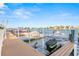 This property features a private dock with multiple boat slips and easy access to the open water for boating and recreation at 8921 Blind Pass Rd # 142, St Pete Beach, FL 33706