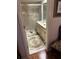 Well-maintained bathroom with glass-door shower and neutral-toned fixtures, with decorative rug at 9302 Trowbridge Ct, New Port Richey, FL 34655