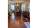 Formal dining room featuring a chandelier and ample seating at 9302 Trowbridge Ct, New Port Richey, FL 34655