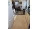 Cozy kitchen with ample counter space, flowing into a charming dining area at 9302 Trowbridge Ct, New Port Richey, FL 34655