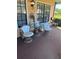Cozy porch with seating area, perfect for relaxing outdoors at 9302 Trowbridge Ct, New Port Richey, FL 34655