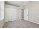 Neutral bedroom with large closet and carpet at 9329 Huntington Park Way, Tampa, FL 33647