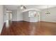 A spacious living room with hardwood floors and lots of natural light at 9329 Huntington Park Way, Tampa, FL 33647