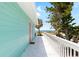 Coastal home boasts a charming exterior with a pathway leading to the beach at 9760 Little Gasparilla Island, Placida, FL 33946