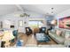 Cozy living room featuring coastal decor, comfortable seating, and a beach view at 9760 Little Gasparilla Island, Placida, FL 33946