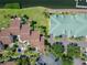 Aerial shot featuring buildings with lush green lawns, mature palms, and convenient parking areas at 1028 Apollo Beach Blvd # 21, Apollo Beach, FL 33572