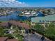 Scenic aerial view of waterfront homes and docks, near a community with lush landscaping and convenient parking at 1028 Apollo Beach Blvd # 21, Apollo Beach, FL 33572