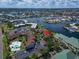 Beautiful aerial showcasing the waterfront community, pool, lush landscaping, and ample parking at 1028 Apollo Beach Blvd # 21, Apollo Beach, FL 33572