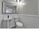 Clean bathroom with modern fixtures and wainscoting at 1028 Apollo Beach Blvd # 21, Apollo Beach, FL 33572