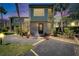 Charming two-story condo featuring a private entrance, updated landscaping, and well-maintained exteriors at 1028 Apollo Beach Blvd # 21, Apollo Beach, FL 33572