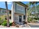 Charming home exterior with colorful siding, well-maintained landscaping, and a welcoming entryway at 1028 Apollo Beach Blvd # 21, Apollo Beach, FL 33572