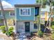 Charming home exterior with colorful siding, well-maintained landscaping, and a welcoming entryway at 1028 Apollo Beach Blvd # 21, Apollo Beach, FL 33572