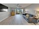Spacious living room with a view of the water and modern decor at 1028 Apollo Beach Blvd # 21, Apollo Beach, FL 33572
