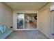 Enclosed patio with sliding glass doors leading to the living room and view of the backyard at 1028 Apollo Beach Blvd # 21, Apollo Beach, FL 33572