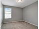 Neutral bedroom with carpeting and natural light from one window at 1107 Seminole Sky Dr, Ruskin, FL 33570