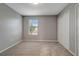Neutral bedroom features carpeted floors, closet and gray wall color at 1107 Seminole Sky Dr, Ruskin, FL 33570