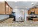 Kitchen showcasing granite counters and stainless steel appliances at 1107 Seminole Sky Dr, Ruskin, FL 33570