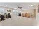 Large bonus room with neutral carpet, ideal for versatile use at 11706 Gilmerton Dr, Riverview, FL 33579
