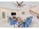 Inviting living room with tile flooring, comfortable seating, and lots of natural light at 11706 Gilmerton Dr, Riverview, FL 33579