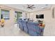 Bright living room with sliding glass doors to the backyard, offering seamless indoor-outdoor living at 11706 Gilmerton Dr, Riverview, FL 33579