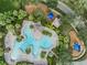 Aerial view of a sparkling community pool and playground at 11706 Gilmerton Dr, Riverview, FL 33579