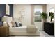 Serene bedroom showcasing sophisticated decor, and a soothing color scheme, perfect for relaxation and restful sleep at 11761 E 71St Ter, Palmetto, FL 34221