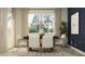 Elegant dining room featuring neutral tones, a modern dining table, white chairs, a large window, and artistic decor at 11761 E 71St Ter, Palmetto, FL 34221
