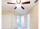 Bonus room with ceiling fan, plush carpet, and closet for storage at 11903 Greengate Dr, Hudson, FL 34669