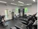 Well-equipped gym with modern treadmills, exercise machines, and ample space for a complete workout at 11903 Greengate Dr, Hudson, FL 34669